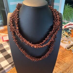 Appleseed necklace